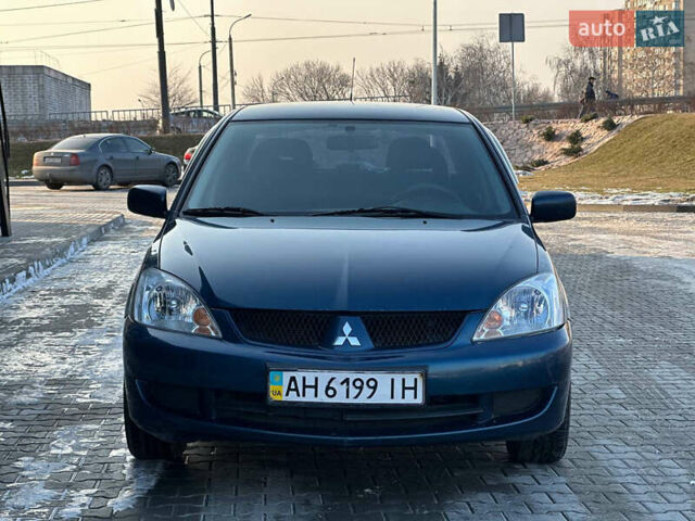 Синій Міцубісі Lancer, об'ємом двигуна 1.6 л та пробігом 250 тис. км за 5499 $, фото 2 на Automoto.ua