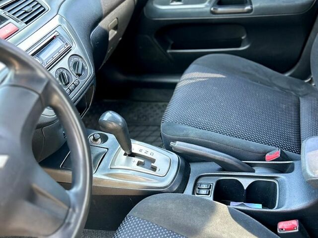 Мицубиси Лансер 2009 в Днепре (Днепропетровске) на Automoto.ua Синий Мицубиси Лансер, объемом двигателя 1.6 л и пробегом 250 тыс. км за 4999 $, фото 10 на Automoto.ua