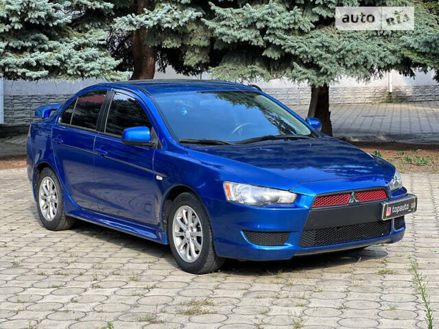 Синій Міцубісі Lancer, об'ємом двигуна 2 л та пробігом 201 тис. км за 7300 $, фото 2 на Automoto.ua