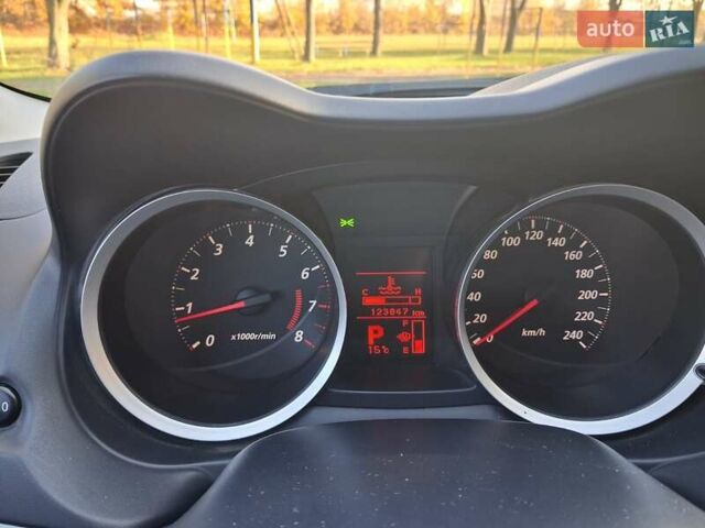 Синий Мицубиси Лансер, объемом двигателя 1.5 л и пробегом 123 тыс. км за 8500 $, фото 7 на Automoto.ua