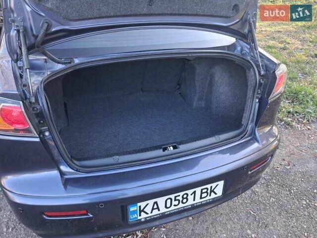 Синий Мицубиси Лансер, объемом двигателя 1.5 л и пробегом 123 тыс. км за 8500 $, фото 10 на Automoto.ua