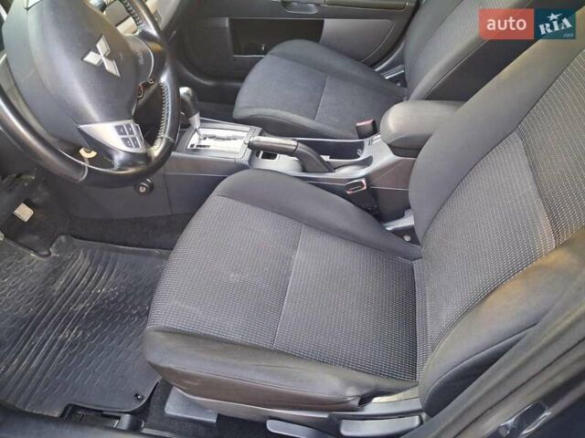 Синий Мицубиси Лансер, объемом двигателя 1.5 л и пробегом 123 тыс. км за 8500 $, фото 8 на Automoto.ua