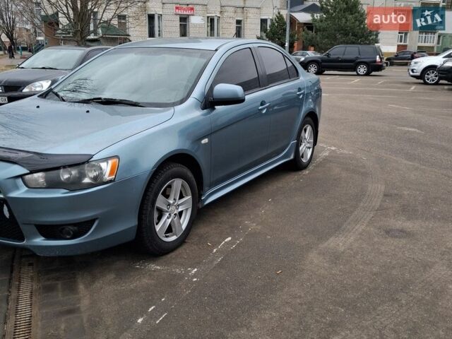 Синий Мицубиси Лансер, объемом двигателя 2 л и пробегом 350 тыс. км за 5700 $, фото 1 на Automoto.ua