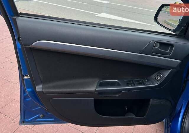 Синий Мицубиси Лансер, объемом двигателя 1.5 л и пробегом 167 тыс. км за 5500 $, фото 13 на Automoto.ua