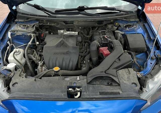 Синий Мицубиси Лансер, объемом двигателя 1.5 л и пробегом 167 тыс. км за 5500 $, фото 20 на Automoto.ua