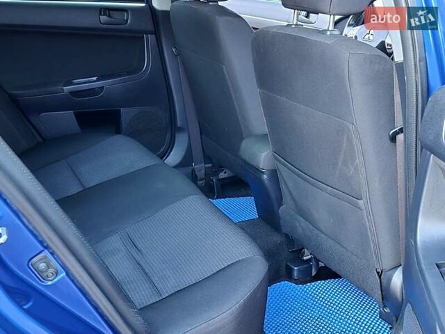 Синий Мицубиси Лансер, объемом двигателя 2 л и пробегом 250 тыс. км за 7699 $, фото 44 на Automoto.ua