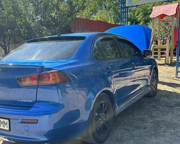 Синій Міцубісі Lancer, об'ємом двигуна 2 л та пробігом 199 тис. км за 6500 $, фото 3 на Automoto.ua