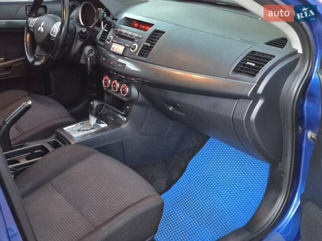 Синий Мицубиси Лансер, объемом двигателя 2 л и пробегом 250 тыс. км за 7699 $, фото 36 на Automoto.ua