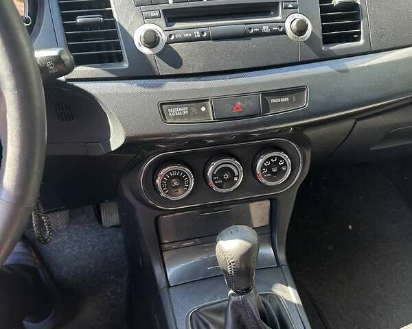 Синій Міцубісі Lancer, об'ємом двигуна 2 л та пробігом 199 тис. км за 6500 $, фото 1 на Automoto.ua