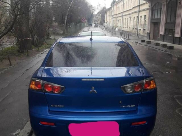 Синий Мицубиси Лансер, объемом двигателя 1.5 л и пробегом 315 тыс. км за 6000 $, фото 1 на Automoto.ua
