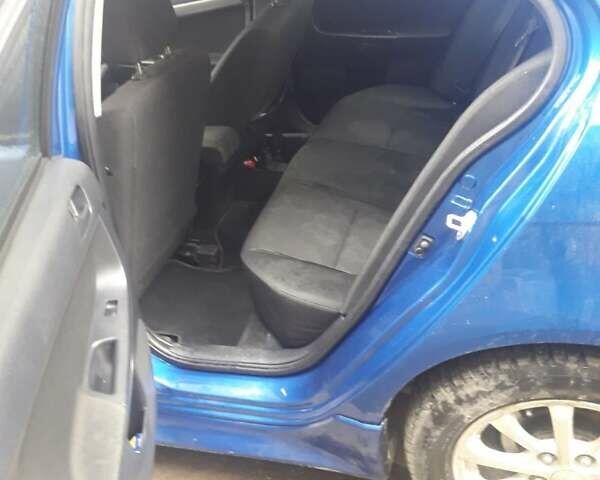 Синій Міцубісі Lancer, об'ємом двигуна 1.5 л та пробігом 315 тис. км за 6000 $, фото 3 на Automoto.ua
