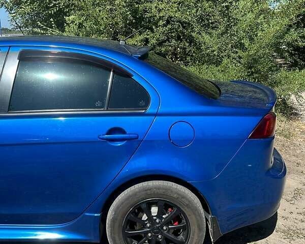 Синій Міцубісі Lancer, об'ємом двигуна 2 л та пробігом 199 тис. км за 6500 $, фото 15 на Automoto.ua