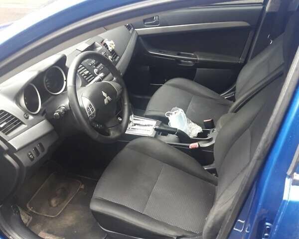 Синій Міцубісі Lancer, об'ємом двигуна 1.5 л та пробігом 315 тис. км за 6000 $, фото 4 на Automoto.ua