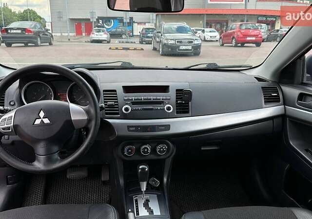 Синий Мицубиси Лансер, объемом двигателя 1.5 л и пробегом 167 тыс. км за 5500 $, фото 16 на Automoto.ua