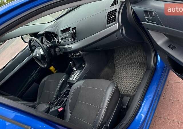 Синий Мицубиси Лансер, объемом двигателя 1.5 л и пробегом 167 тыс. км за 5500 $, фото 18 на Automoto.ua