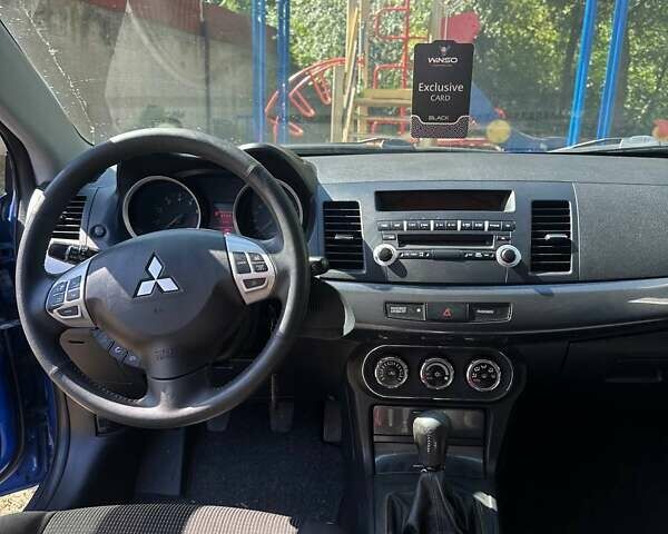 Синій Міцубісі Lancer, об'ємом двигуна 2 л та пробігом 199 тис. км за 6500 $, фото 9 на Automoto.ua