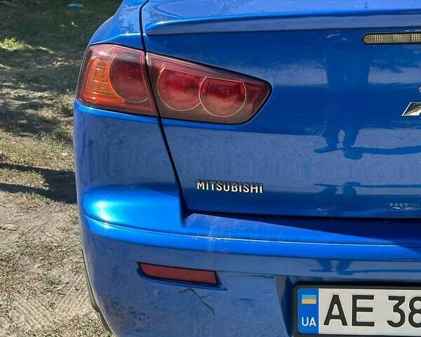 Синій Міцубісі Lancer, об'ємом двигуна 2 л та пробігом 199 тис. км за 6500 $, фото 4 на Automoto.ua