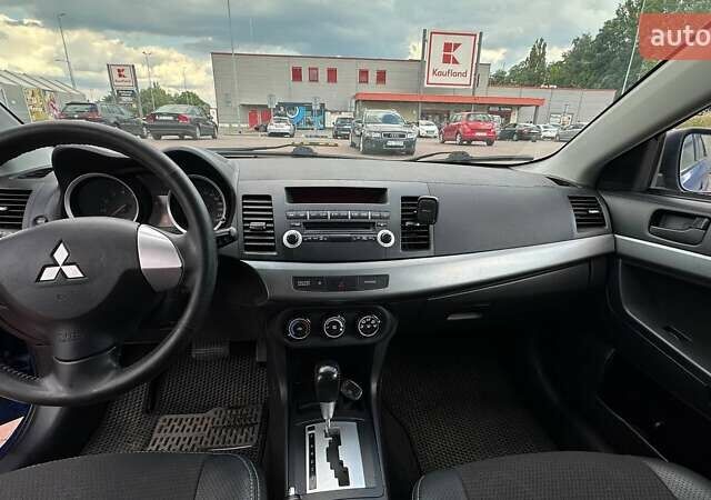 Синий Мицубиси Лансер, объемом двигателя 1.5 л и пробегом 167 тыс. км за 5500 $, фото 8 на Automoto.ua