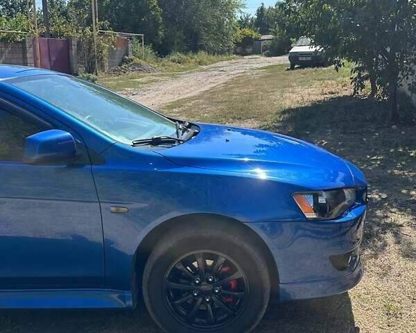 Синій Міцубісі Lancer, об'ємом двигуна 2 л та пробігом 199 тис. км за 6500 $, фото 7 на Automoto.ua