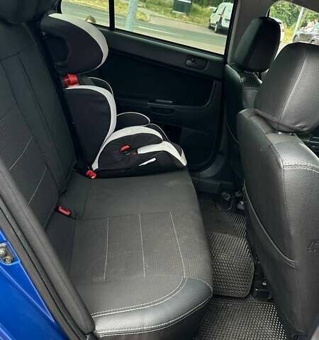 Синий Мицубиси Лансер, объемом двигателя 1.5 л и пробегом 167 тыс. км за 5500 $, фото 19 на Automoto.ua