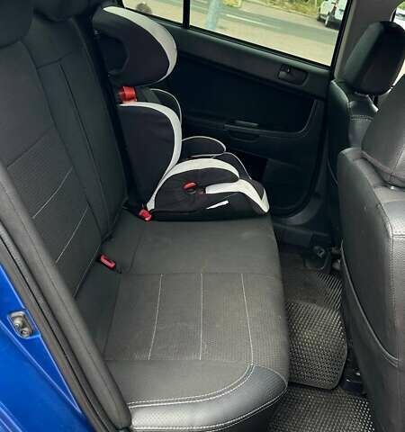 Синий Мицубиси Лансер, объемом двигателя 1.5 л и пробегом 167 тыс. км за 5500 $, фото 10 на Automoto.ua