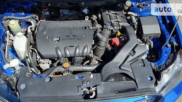 Синий Мицубиси Лансер, объемом двигателя 2 л и пробегом 171 тыс. км за 8750 $, фото 13 на Automoto.ua