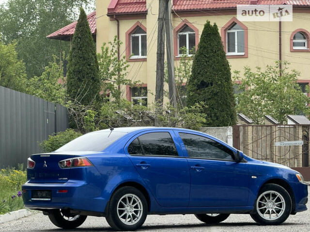 Синій Міцубісі Lancer, об'ємом двигуна 1.59 л та пробігом 150 тис. км за 7850 $, фото 19 на Automoto.ua