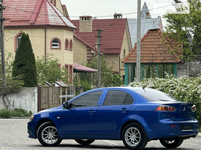 Синій Міцубісі Lancer, об'ємом двигуна 1.59 л та пробігом 150 тис. км за 7850 $, фото 13 на Automoto.ua