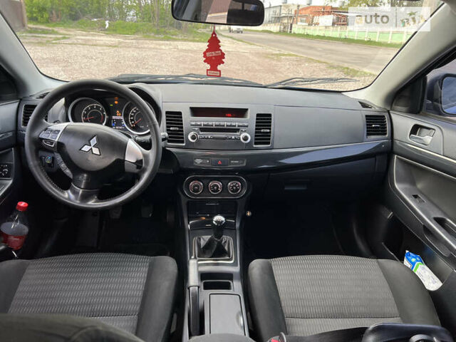 Синій Міцубісі Lancer, об'ємом двигуна 1.6 л та пробігом 266 тис. км за 6999 $, фото 8 на Automoto.ua