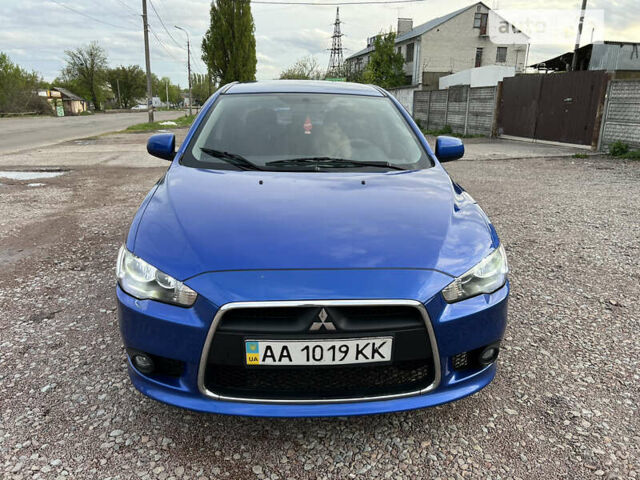 Синій Міцубісі Lancer, об'ємом двигуна 1.6 л та пробігом 266 тис. км за 6999 $, фото 3 на Automoto.ua