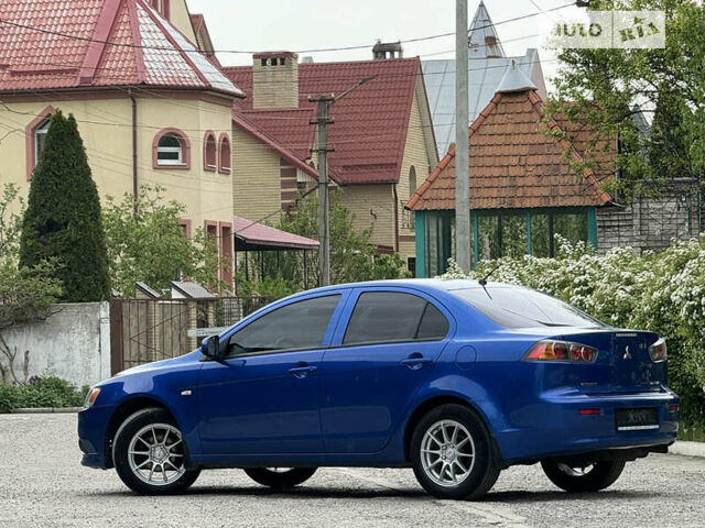 Синій Міцубісі Lancer, об'ємом двигуна 1.59 л та пробігом 150 тис. км за 7850 $, фото 12 на Automoto.ua