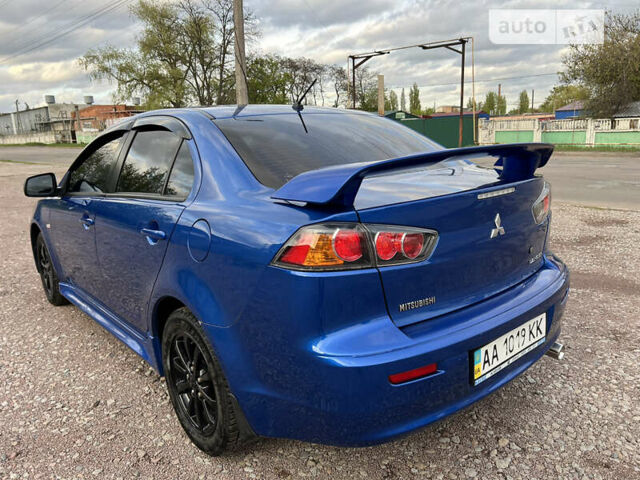 Синій Міцубісі Lancer, об'ємом двигуна 1.6 л та пробігом 266 тис. км за 6999 $, фото 6 на Automoto.ua