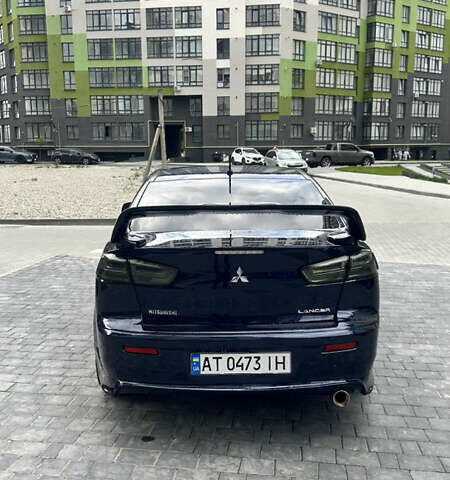 Синий Мицубиси Лансер, объемом двигателя 2 л и пробегом 170 тыс. км за 8400 $, фото 5 на Automoto.ua