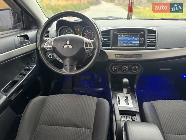 Синий Мицубиси Лансер, объемом двигателя 2.36 л и пробегом 184 тыс. км за 7650 $, фото 11 на Automoto.ua