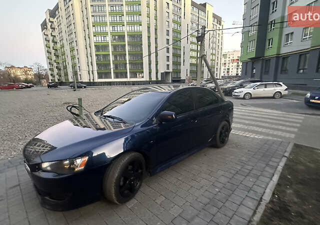 Синий Мицубиси Лансер, объемом двигателя 2 л и пробегом 170 тыс. км за 8400 $, фото 9 на Automoto.ua