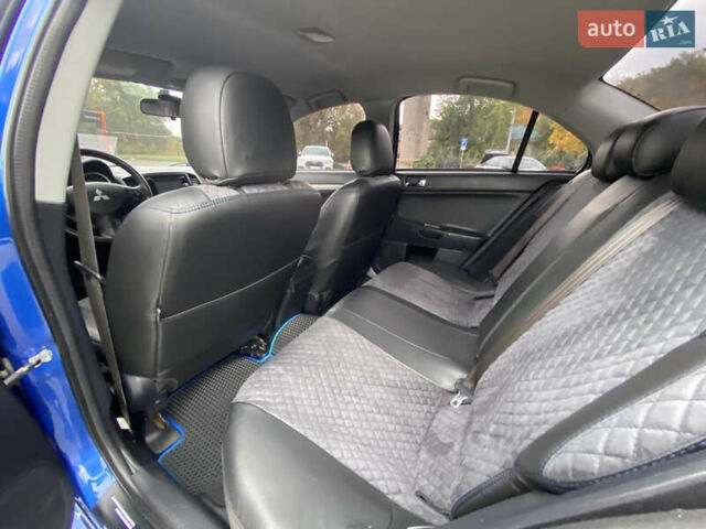 Синий Мицубиси Лансер, объемом двигателя 2.36 л и пробегом 218 тыс. км за 9999 $, фото 23 на Automoto.ua