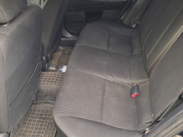 Синий Мицубиси Лансер, объемом двигателя 2 л и пробегом 233 тыс. км за 7000 $, фото 7 на Automoto.ua