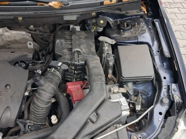 Синий Мицубиси Лансер, объемом двигателя 2 л и пробегом 233 тыс. км за 7000 $, фото 11 на Automoto.ua