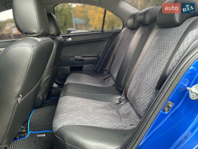 Синий Мицубиси Лансер, объемом двигателя 2.36 л и пробегом 218 тыс. км за 9999 $, фото 22 на Automoto.ua