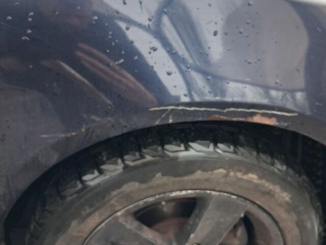 Синий Мицубиси Лансер, объемом двигателя 2 л и пробегом 233 тыс. км за 7000 $, фото 9 на Automoto.ua