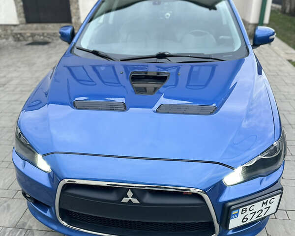 Синій Міцубісі Lancer, об'ємом двигуна 2 л та пробігом 192 тис. км за 15000 $, фото 9 на Automoto.ua