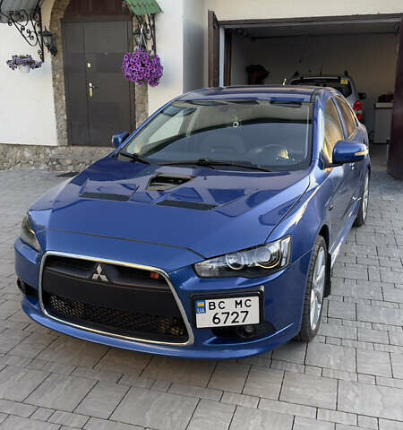 Синій Міцубісі Lancer, об'ємом двигуна 2 л та пробігом 192 тис. км за 15000 $, фото 40 на Automoto.ua