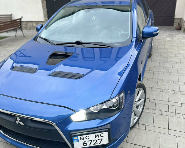 Синій Міцубісі Lancer, об'ємом двигуна 2 л та пробігом 192 тис. км за 15000 $, фото 19 на Automoto.ua