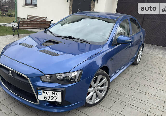 Синій Міцубісі Lancer, об'ємом двигуна 2 л та пробігом 192 тис. км за 15000 $, фото 11 на Automoto.ua