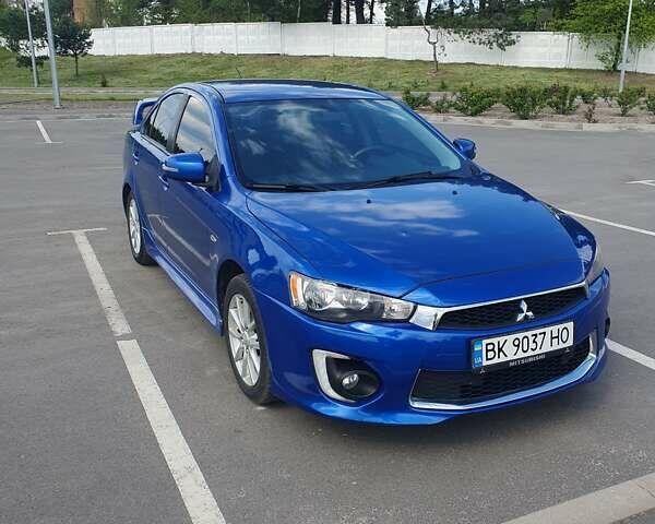 Синій Міцубісі Lancer, об'ємом двигуна 2 л та пробігом 153 тис. км за 8500 $, фото 5 на Automoto.ua