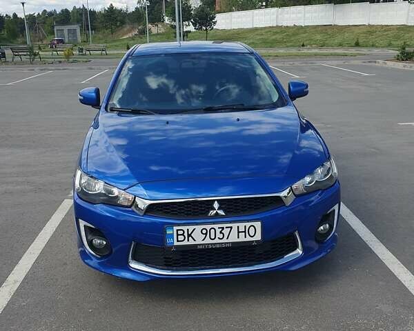 Синій Міцубісі Lancer, об'ємом двигуна 2 л та пробігом 153 тис. км за 8500 $, фото 6 на Automoto.ua