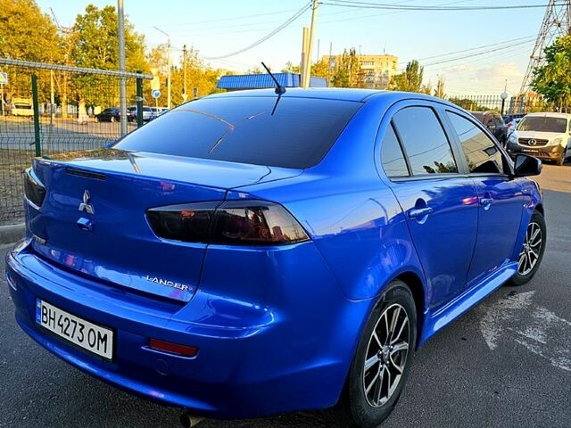 Синий Мицубиси Лансер, объемом двигателя 2 л и пробегом 190 тыс. км за 9999 $, фото 1 на Automoto.ua