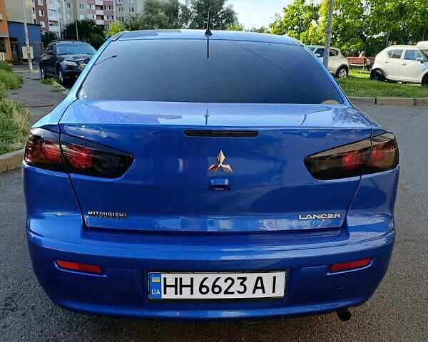 Синий Мицубиси Лансер, объемом двигателя 2 л и пробегом 115 тыс. км за 8700 $, фото 9 на Automoto.ua