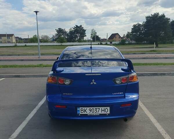 Синій Міцубісі Lancer, об'ємом двигуна 2 л та пробігом 153 тис. км за 8500 $, фото 8 на Automoto.ua