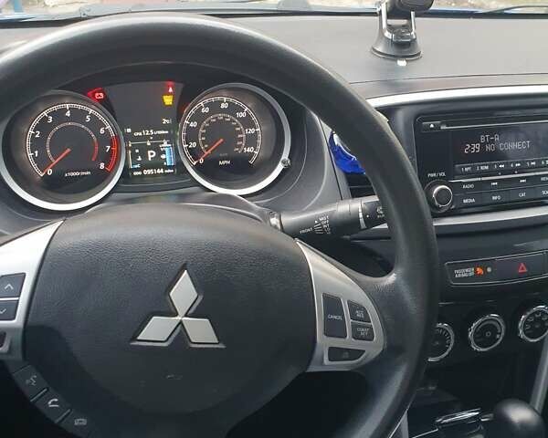 Синій Міцубісі Lancer, об'ємом двигуна 2 л та пробігом 153 тис. км за 8500 $, фото 4 на Automoto.ua